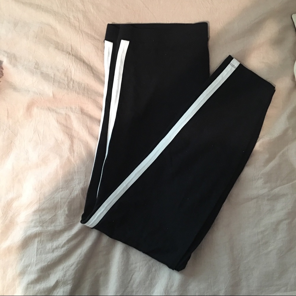 Black leggings with white stripe down the side